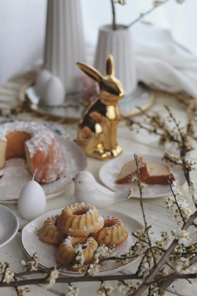 Elegant Easter dessert display with cake and decorations for a festive celebration.